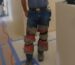 a man wearing duct taping knee carpet on his knees instead of knee pads