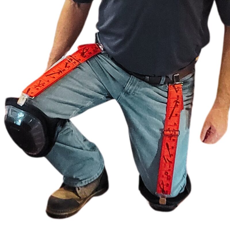 a man kneeling wearing a pair of res tape measure wearing knee pads